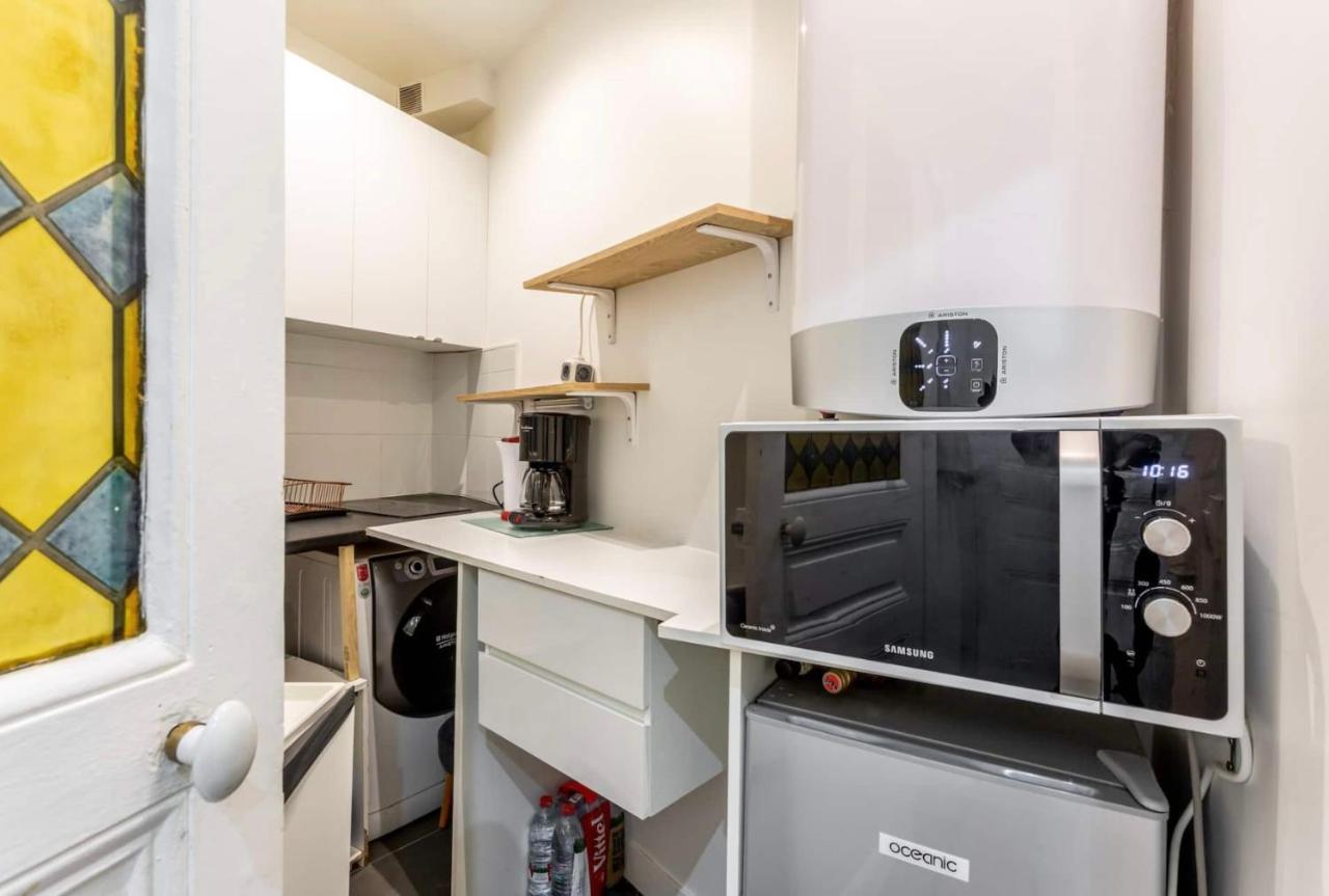 Abbesses - Superbe Appartement Avec Cheminees Paris Exterior foto